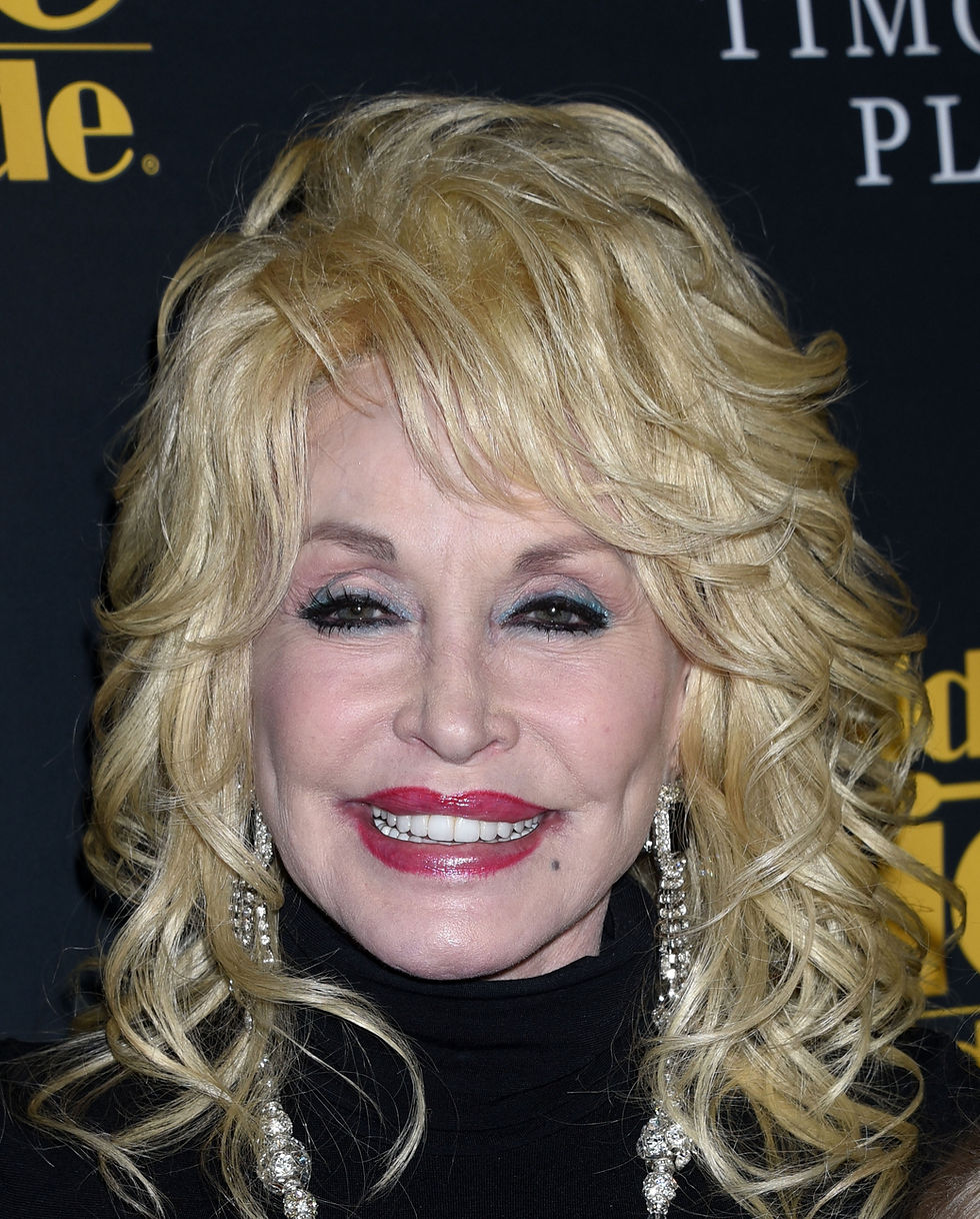 A photo of Dolly Parton's smiling face.