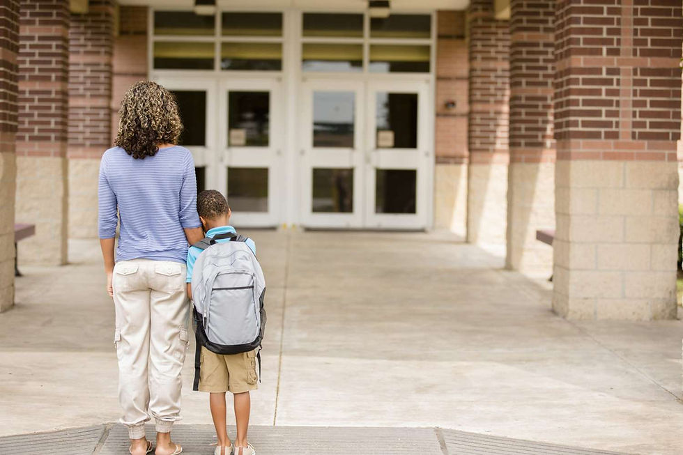 Boy struggling to leave his mummy