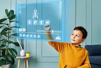 Child plays with a holographic screen