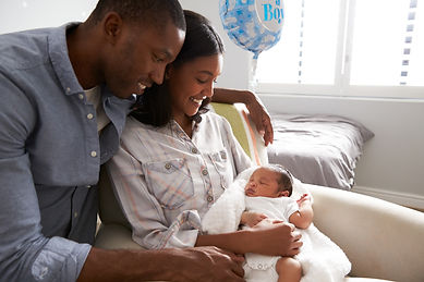 black family with newborn